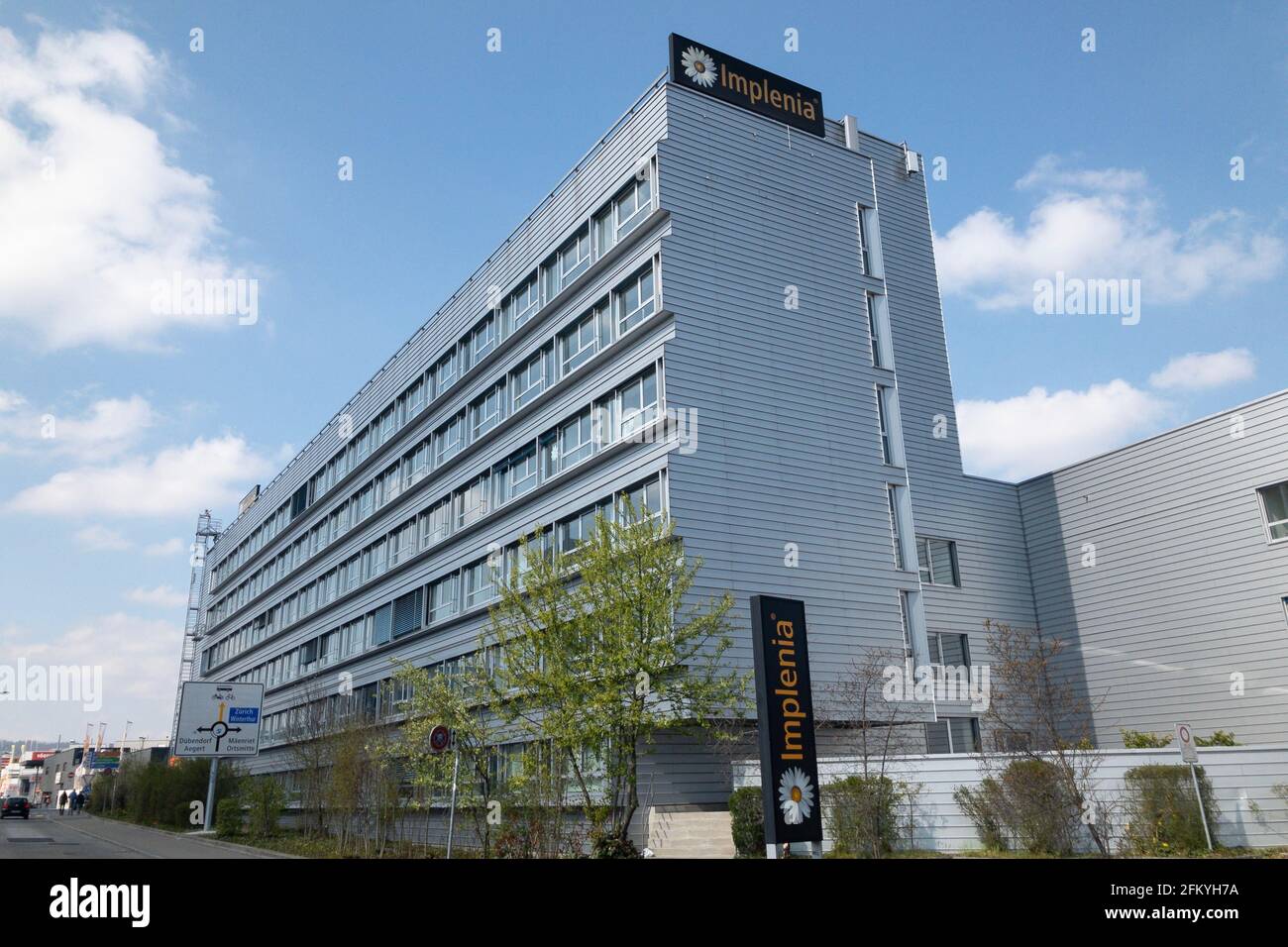Dietlikon, Zurich, Switzerland - 16th April 2021 : Implenia company headquarters building in Dietlikon, Switzerland. Implenia is a Swiss construction Stock Photo