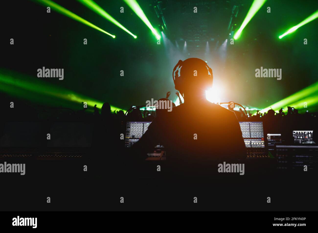 Sound engineer working at mixing panel on a big concert Stock Photo - Alamy