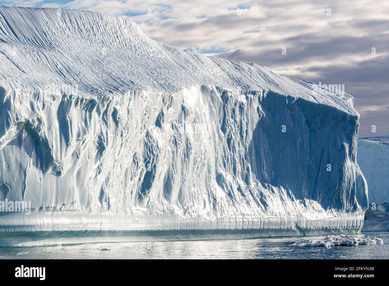 Massive icebergs calved from the Jakobshavn Isbræ glacier, UNESCO World Heritage site, Ilulissat, Greenland. Stock Photo