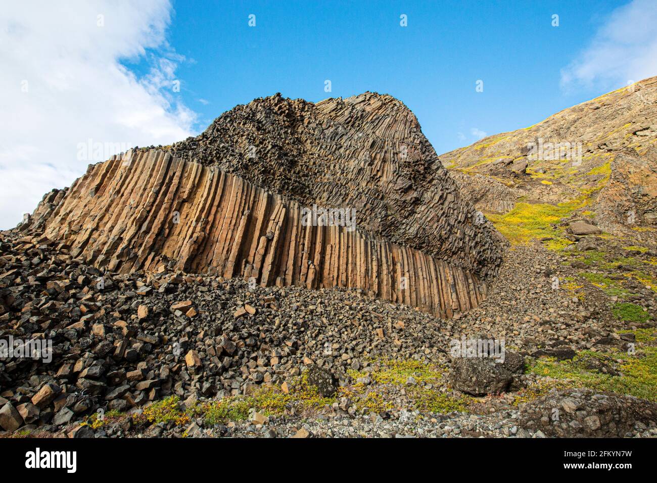 Open tundra and columnar basalt in Brededal, Disko Island, Qeqertarsuaq, Baffin Bay, Greenland. Stock Photo