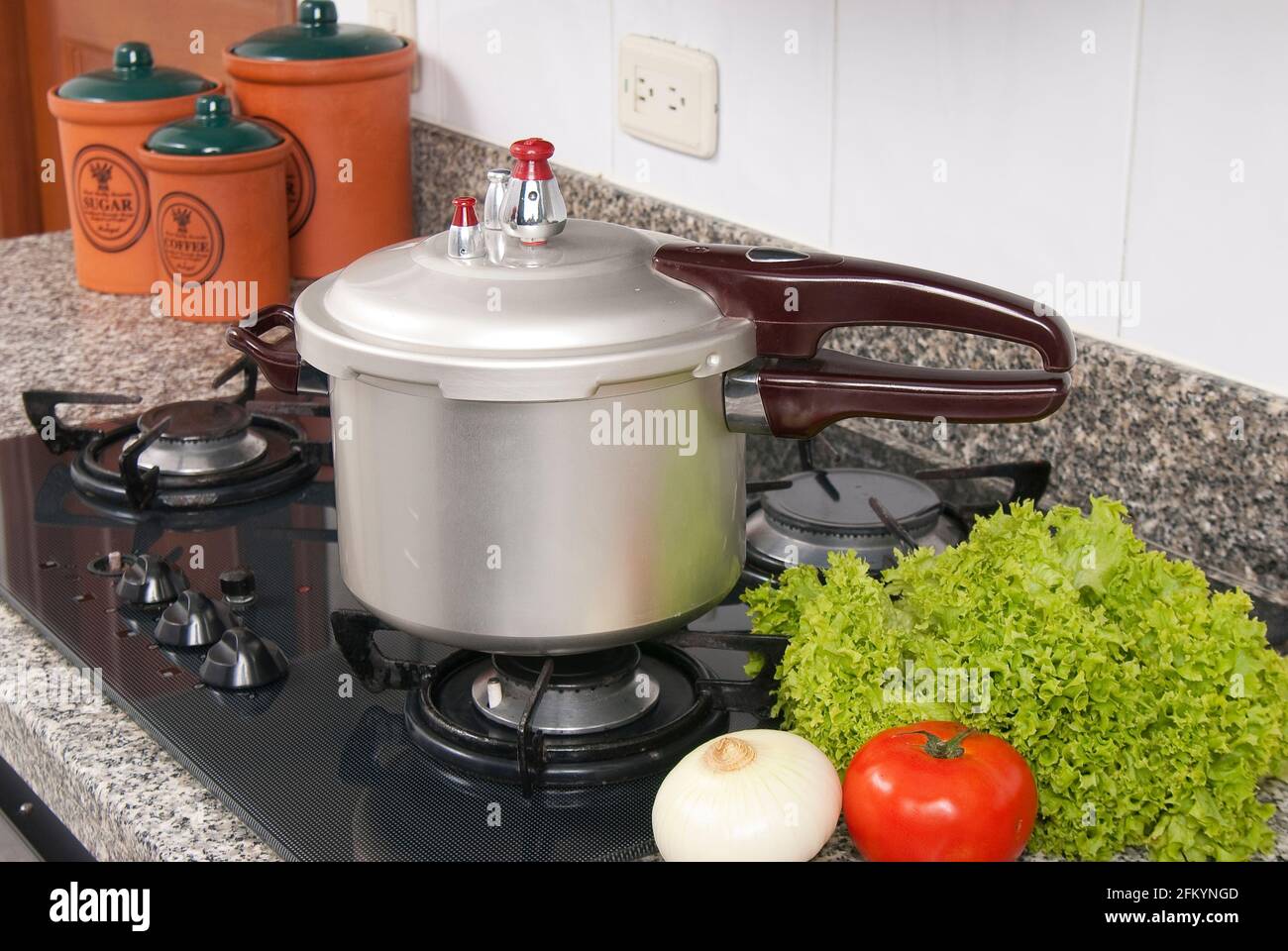 Pressure cooker; photo about stove in the kitchen. Stock Photo