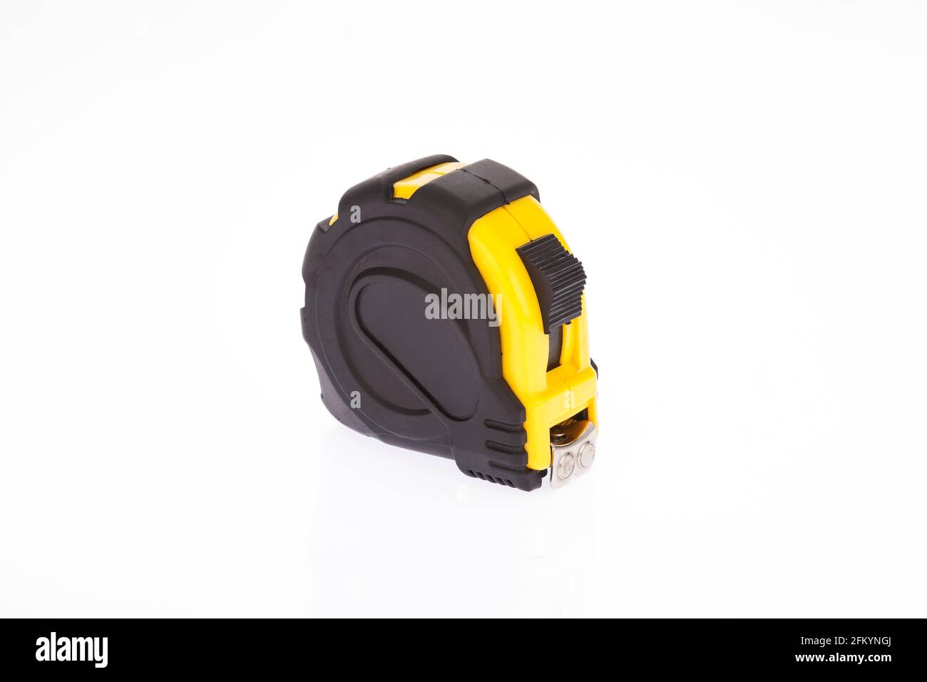Yellow flexometer with black on white background. Stock Photo
