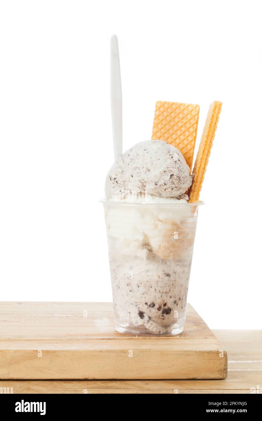Plastic cup with ice cream; photo on white background Stock Photo - Alamy