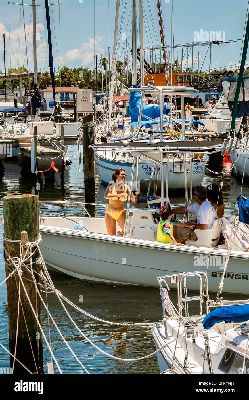 Family exiting Saint Petersburg marina for a day on the water in Tampa Bay. Saint Petersburg, Florida Stock Photo