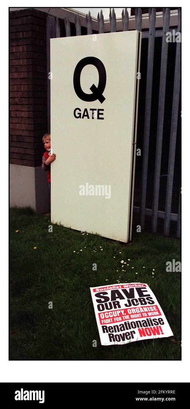Young Cameron Robinson (3.5 yrs)plays outside the main gate of Longbridge Rover, Birmingham while waiting for his father Shop Steward Ian Robinson one of the delegation who have been to Germany to meet with BMW management.pic David Sandison 28/4/00 Stock Photo