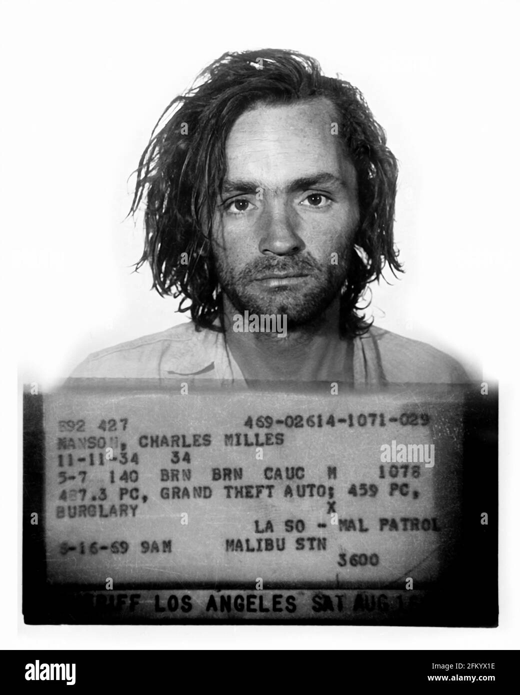 1969 , 16 august, USA : Mugshot of famous american satanist cult leader and criminal killer CHARLES Milles MANSON SATANA ( 1934 - 2017 ). In mid-1967, he formed what became known as the ' Manson Family ', a quasi-commune based in California. His followers committed a series of nine murders at four locations in July and August 1969 . In 1971, he was convicted of first-degree murder and conspiracy to commit murder for the deaths of seven people, including the film actress Sharon Tate . Unknown photographer of Ventura California Prison , California Department of Corrections and Rehabilitation mug Stock Photo