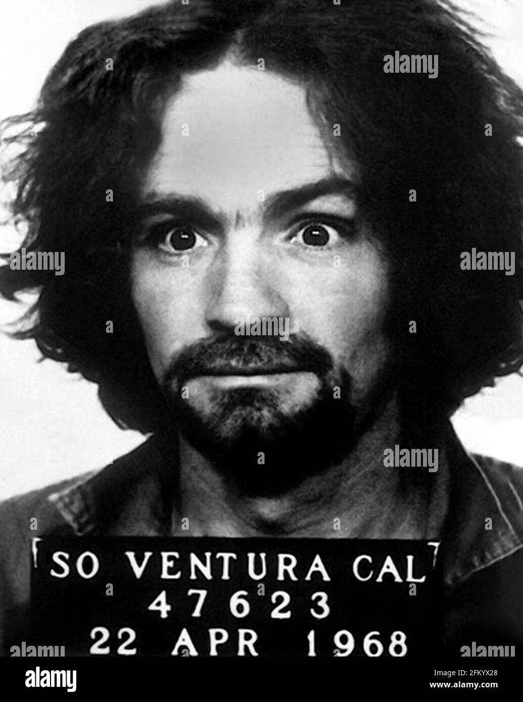 1968 , 22 april , USA : Mugshot of famous american satanist cult leader and criminal killer CHARLES Milles MANSON SATANA ( 1934 - 2017 ). In mid-1967, he formed what became known as the ' Manson Family ', a quasi-commune based in California. His followers committed a series of nine murders at four locations in July and August 1969 . In 1971, he was convicted of first-degree murder and conspiracy to commit murder for the deaths of seven people, including the film actress Sharon Tate . Unknown photographer of Ventura California Prison , California Department of Corrections and Rehabilitation mug Stock Photo