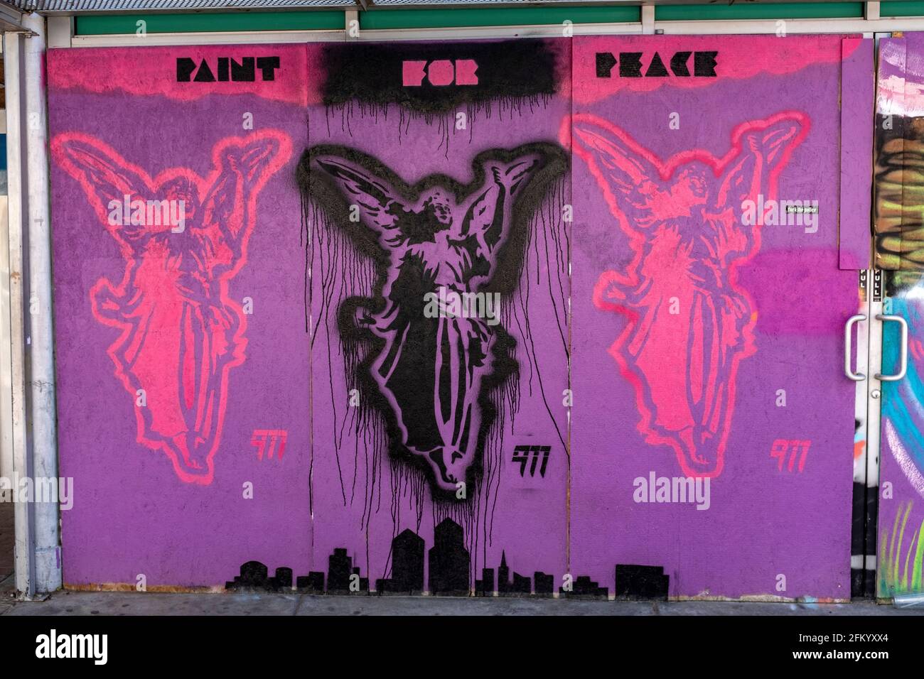 artwork covering boarded up storefronts after downtown Albuquerque protests turn violent post George Floyd death (Paint For Peace 505) Stock Photo