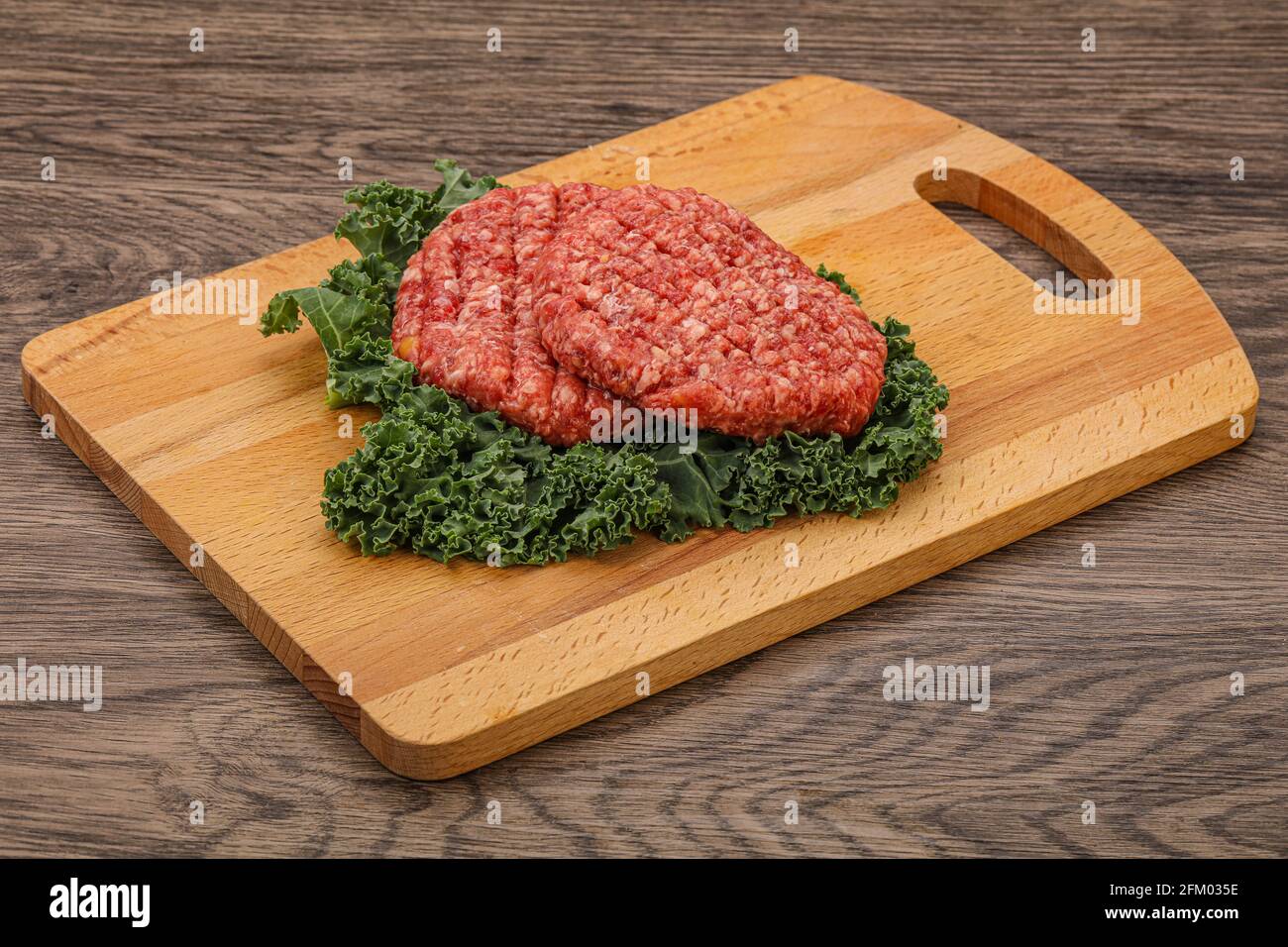 Raw beef burger cutlet for grill Stock Photo Alamy