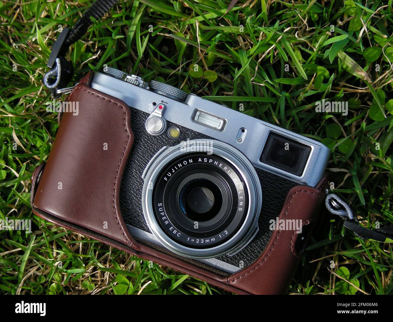 Fujifilm X100s rangefinder style mirrorless compact digital camera on grass  in Ottawa, Ontario, Canada Stock Photo - Alamy