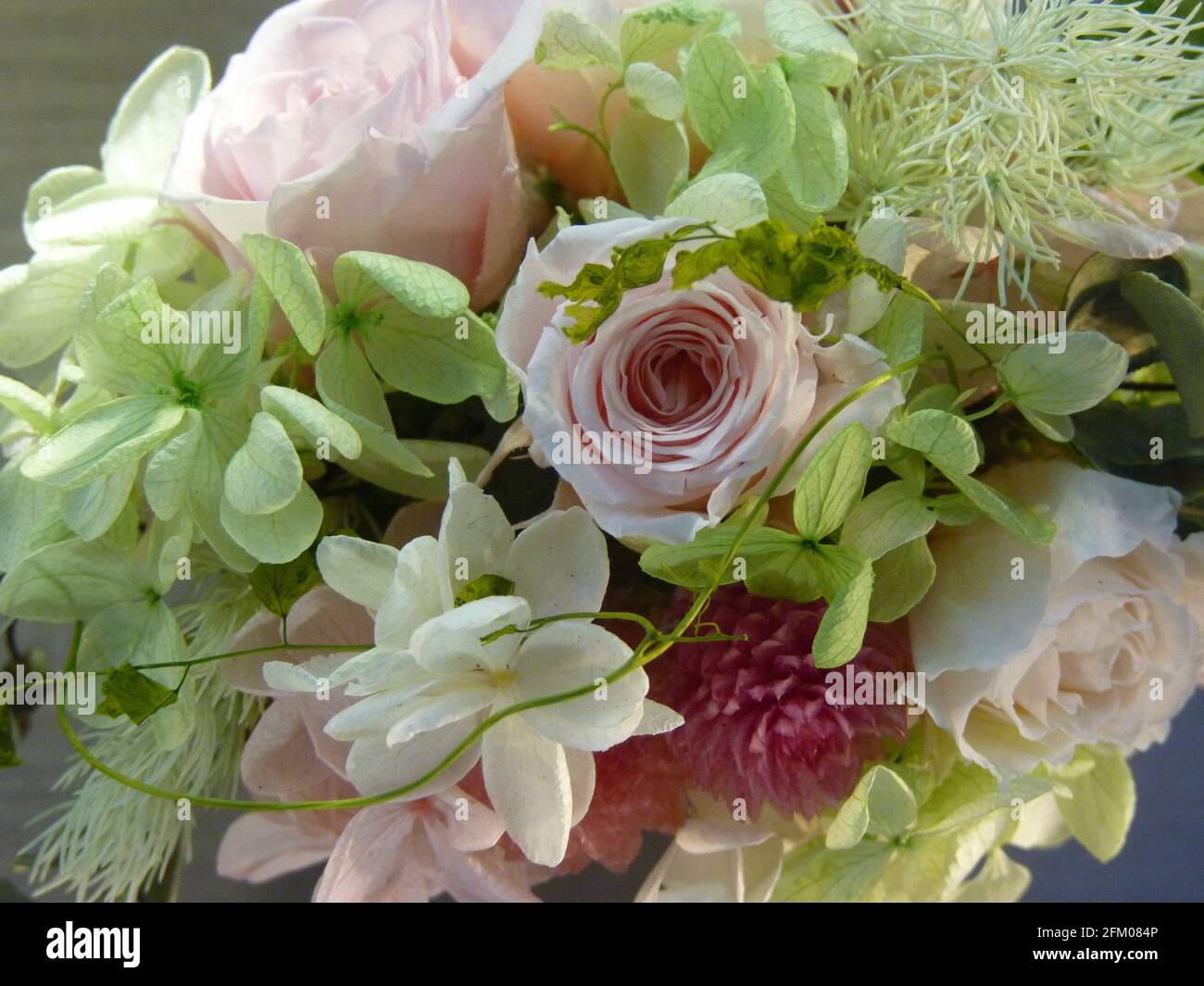 Overhead shot of an artificial floral design of different colors Stock