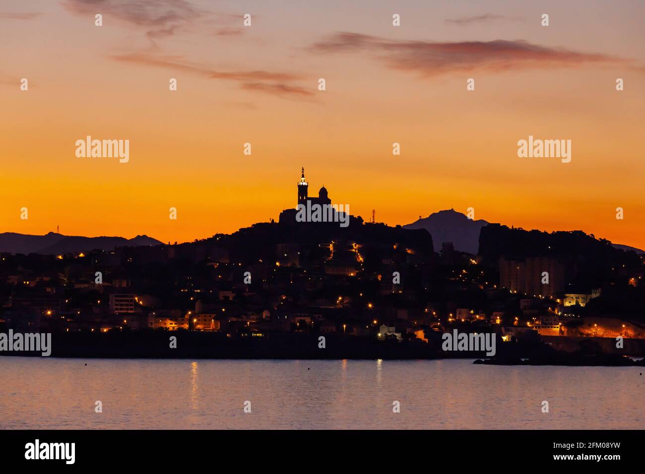 Skyline of Marseille at dawn, seen from the sea. Provence, France Stock Photo