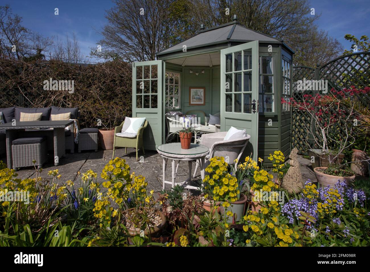 Wooden Summerhouse in Spring English Garden,England Stock Photo