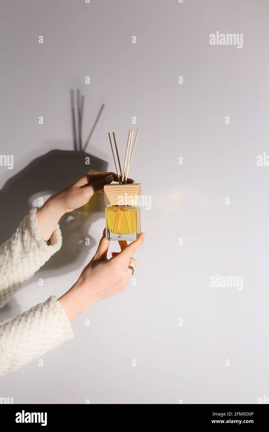 Aromatherapy reed diffuser air freshener on relaxed spa background ...