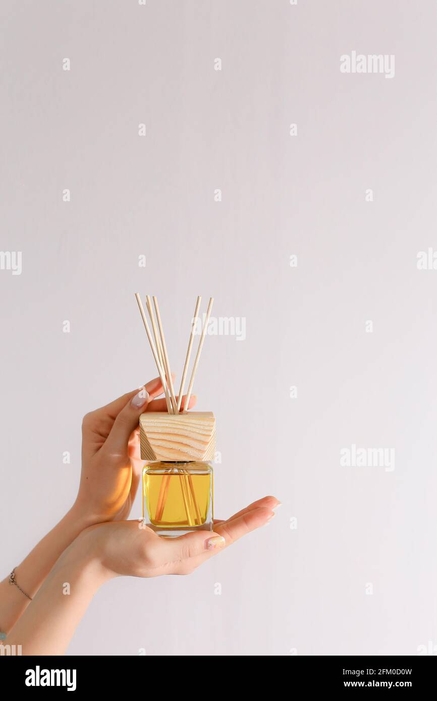 Aromatherapy reed diffuser air freshener on relaxed spa background ...
