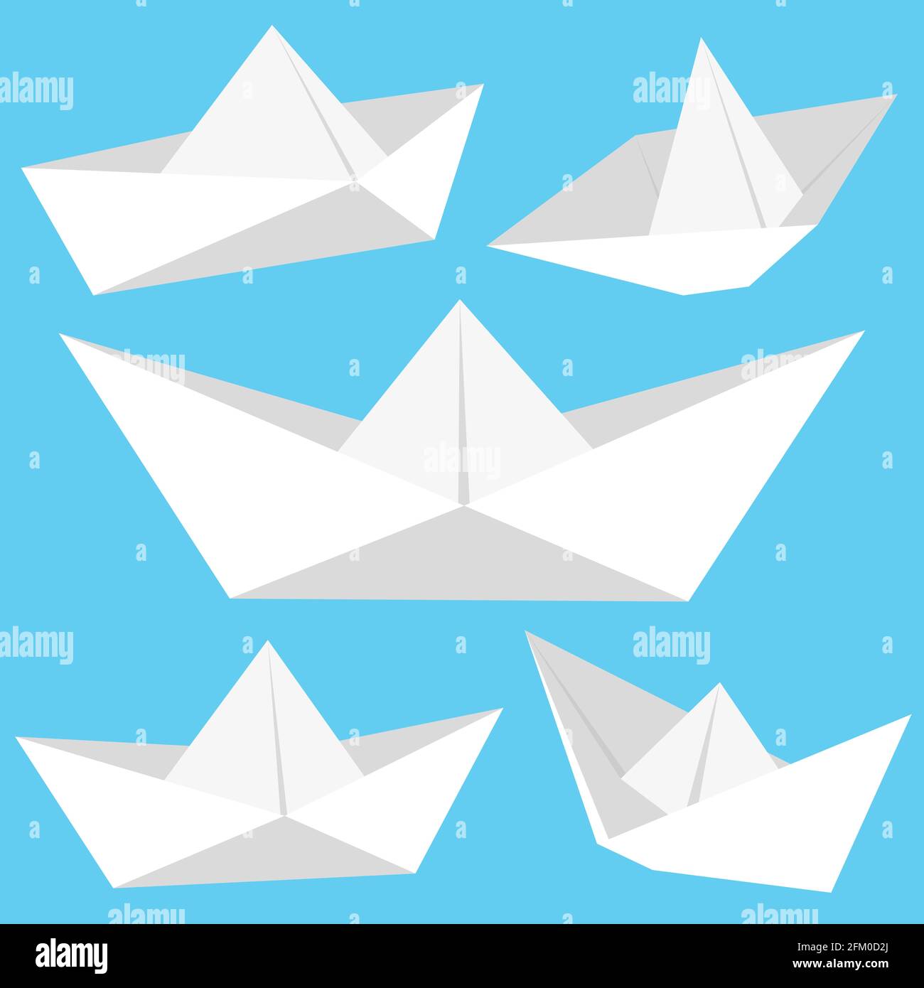 White origami paper boats. Stock Photo