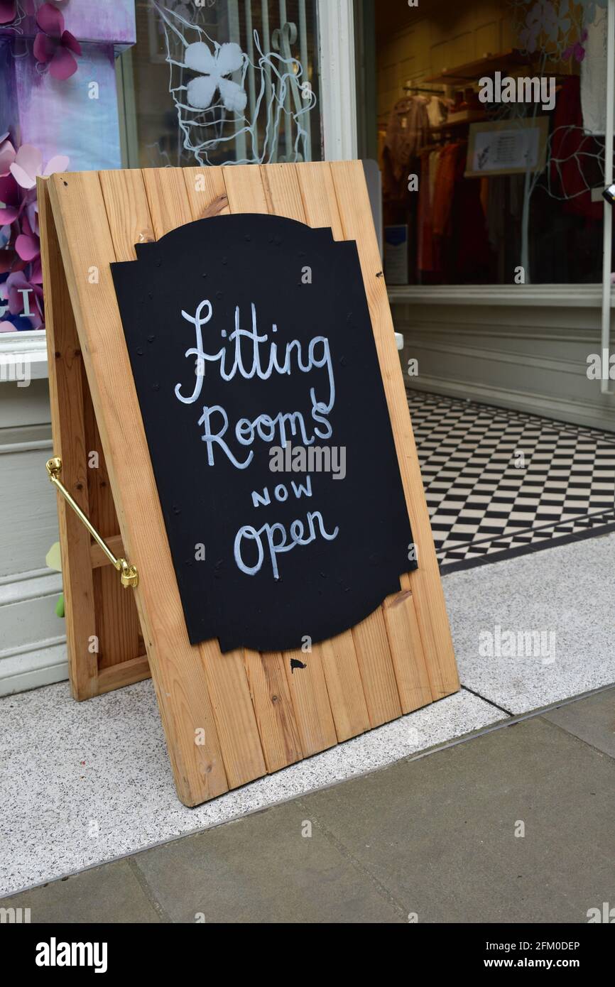High street shops slowly reawaken after the 3 month lockdown in the UK. "Fitting Rooms Now Open