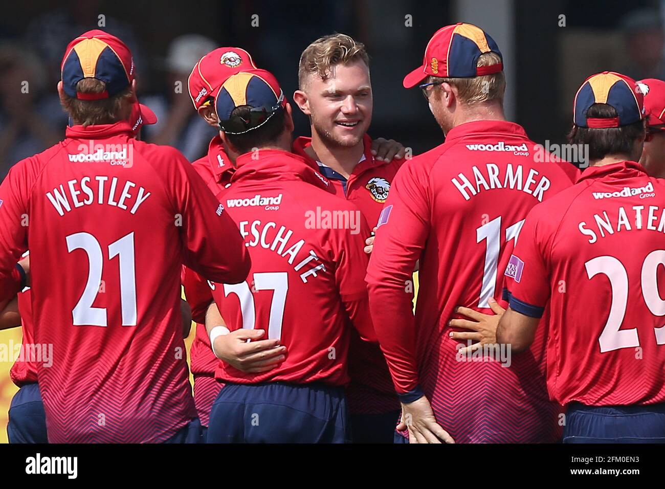 Sam Cook of Essex celebrates with his team mates after taking the ...