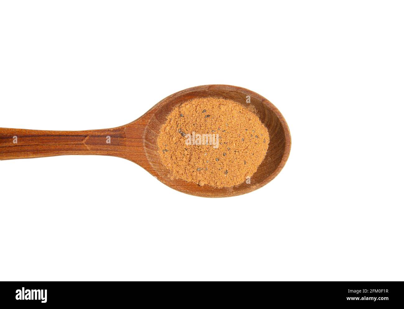 Flat lay view of yellow color  superfood powder on wood spoon, isolated on white with lot of copy space. Stock Photo