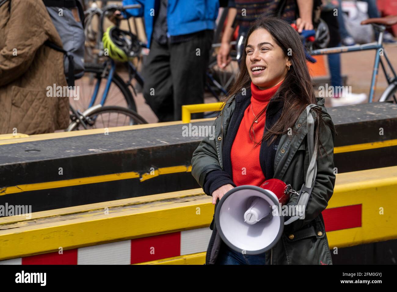 LONDON, UK – 01st May 2021: A Demonstrator is seen holding a megaphone during a crowded Kill the Bill protest, as activists march down The Mall Stock Photo
