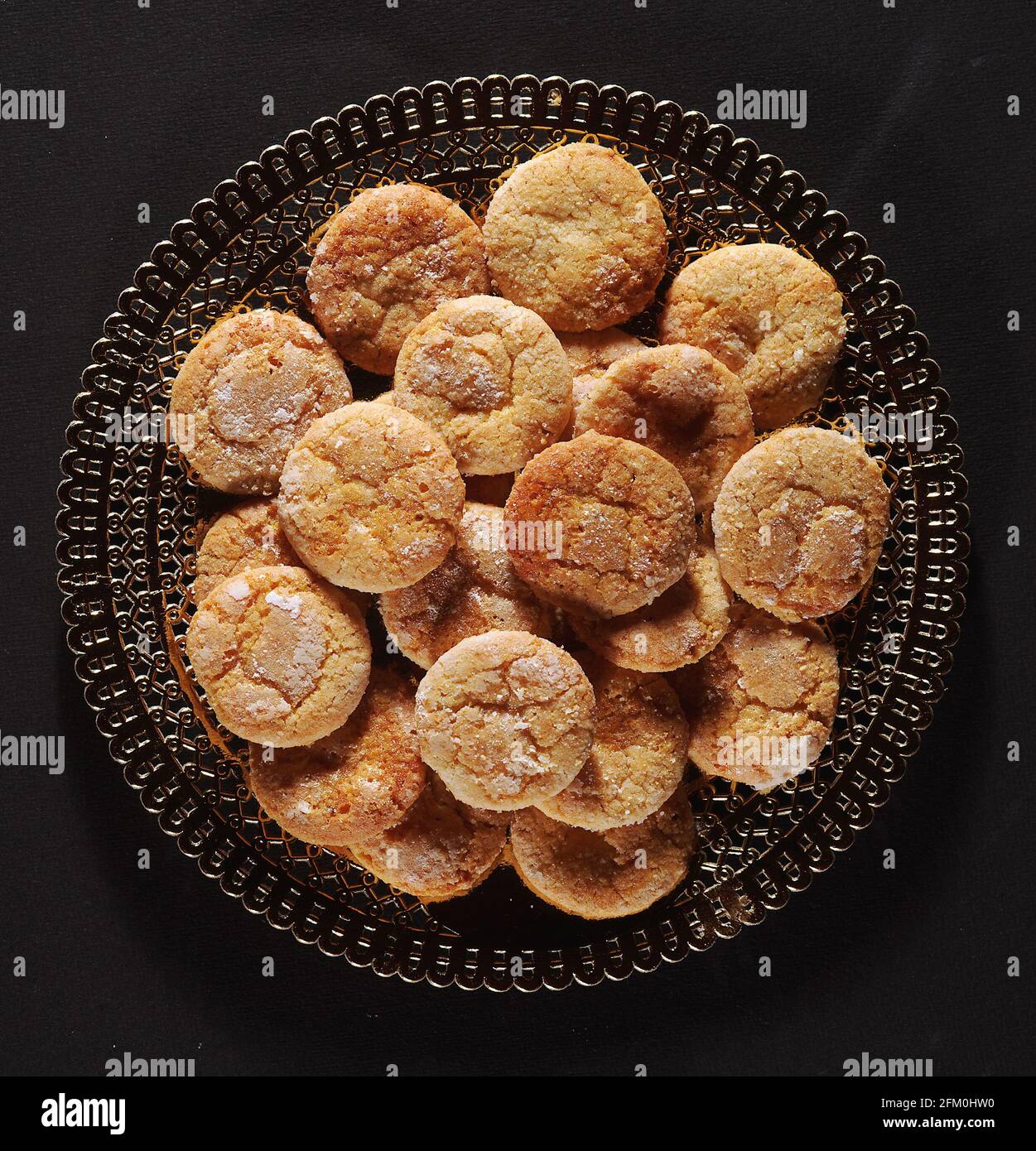 biscuits cookies, still life, artificial light, black background Stock Photo