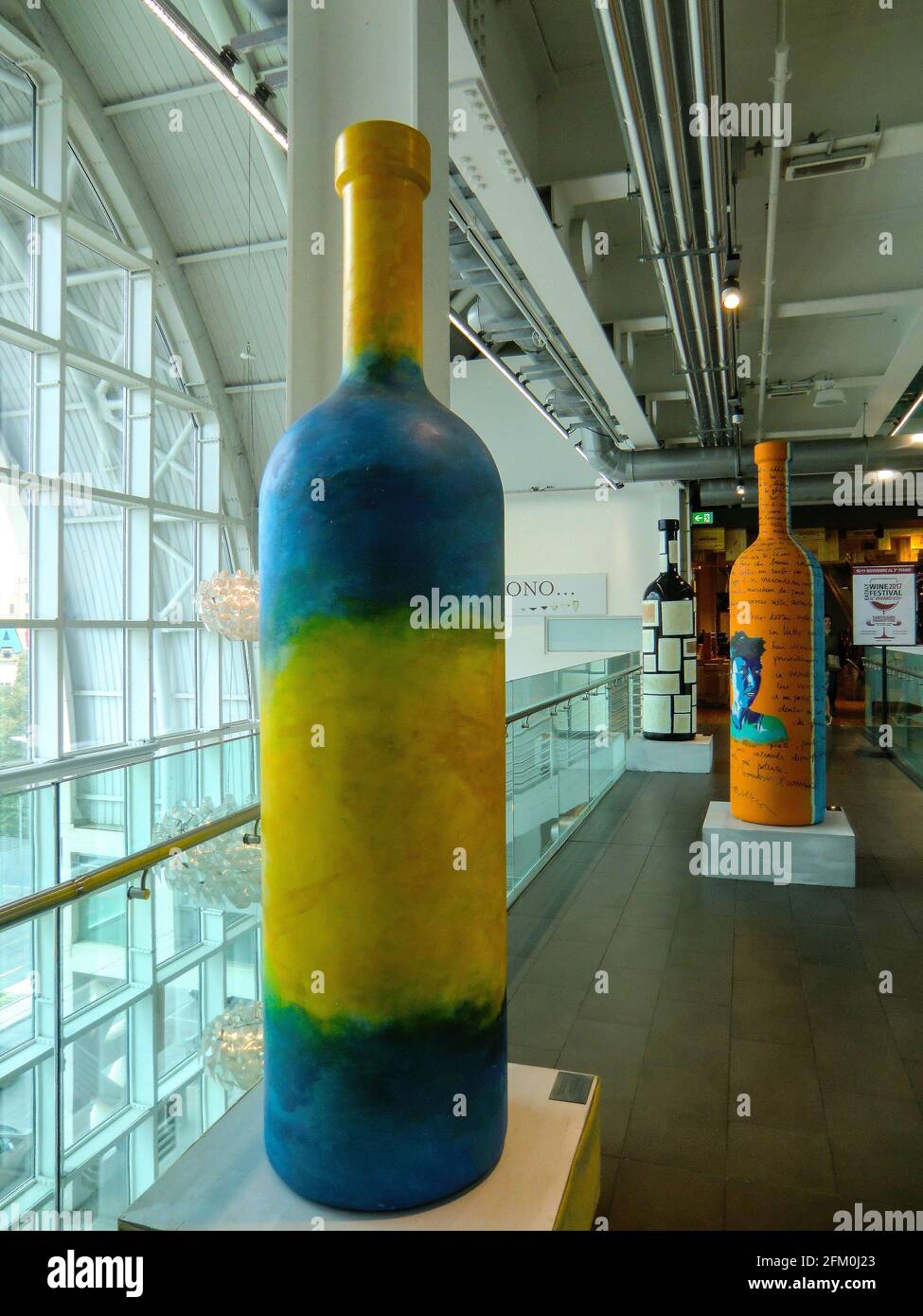 Artistic Giant Bottles of wine exposed at Eataly, Rome, Italian Food