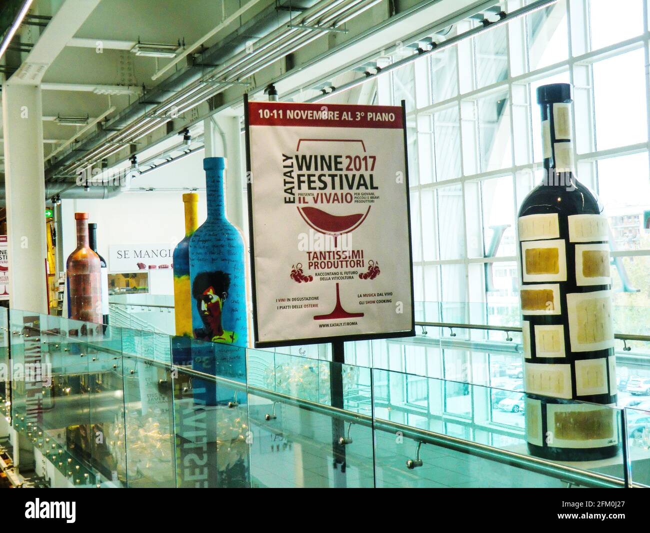 Artistic Giant Bottles of wine exposed at Eataly, Rome, Italian Food