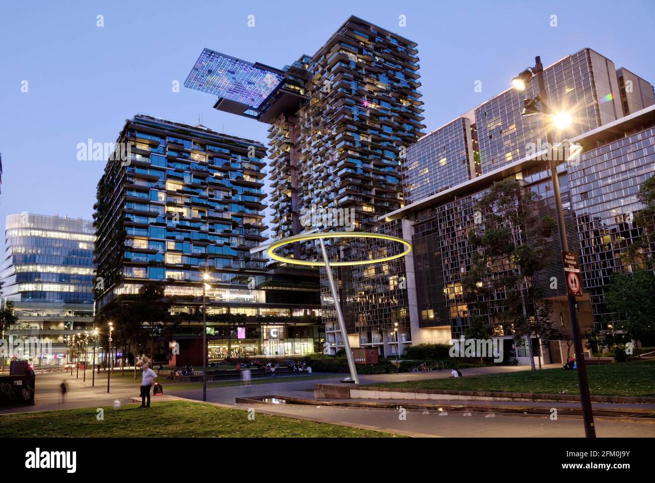 Sunset over the iconic One Central Park apartments a major urban renewal site Chippendale Sydney Australia. Stock Photo