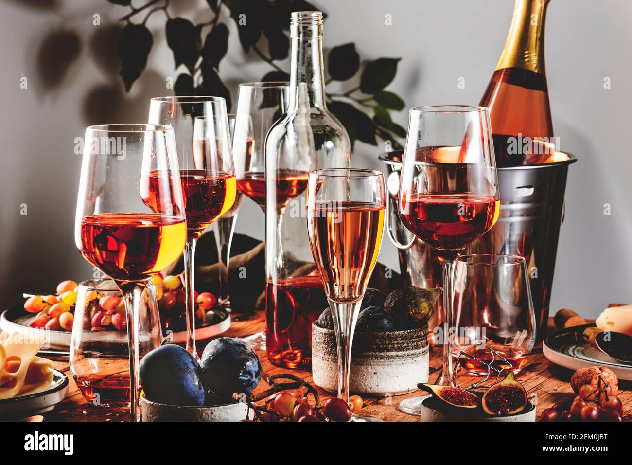 Pink Rose Wine Glasses Bottles Table Served Summer Festive Dinner Stock  Photo by ©5PH 474095700