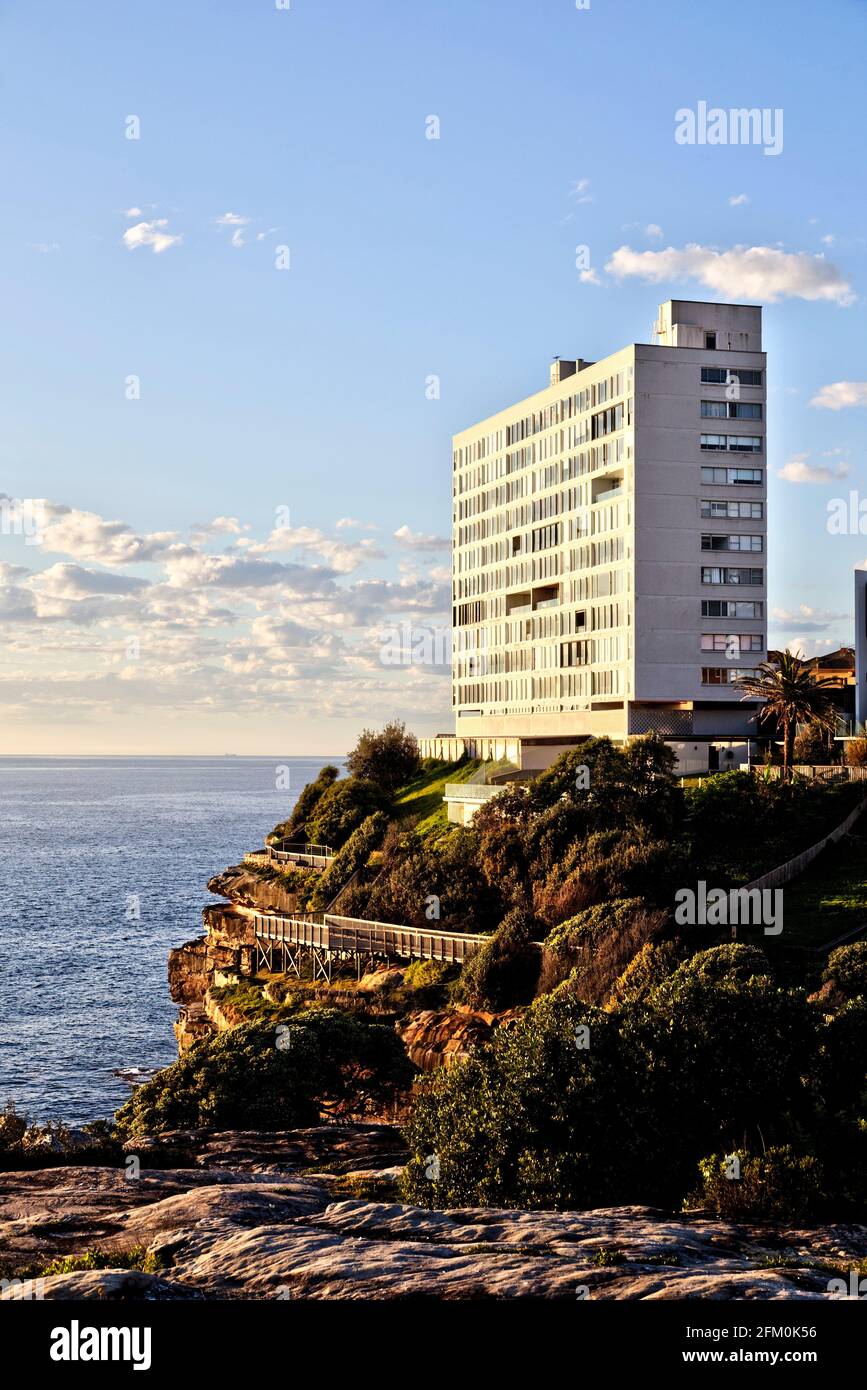 Brutalist architecture example of apartment building built on the foreshore of Diamond Bay Sydney Australia Stock Photo
