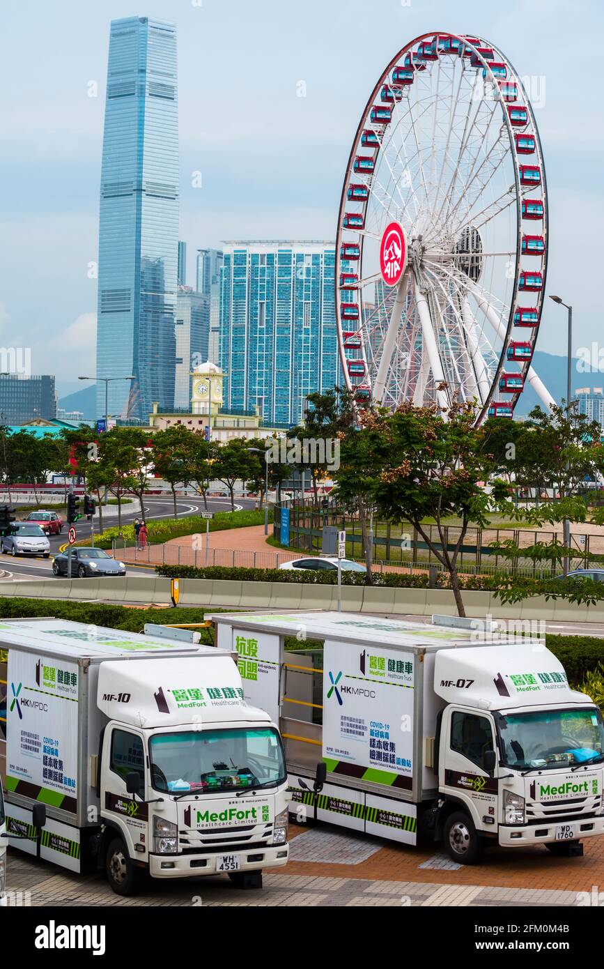 Mobile testing vehicles in Hong Kong providing residents free of charge Covid-19 testing services. Stock Photo