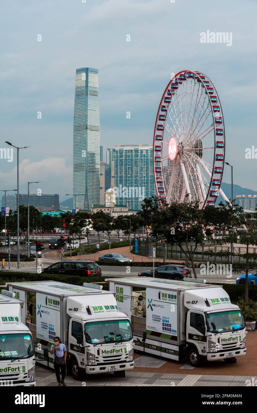 Mobile testing vehicles in Hong Kong providing residents free of charge Covid-19 testing services. Stock Photo