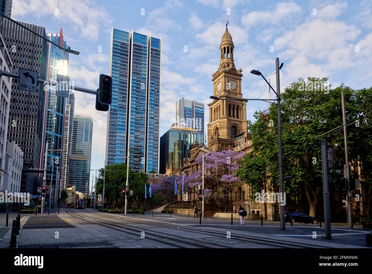 An almost empty George Street in front of the Sydney Town Hall  Sydney Australia during the Covid 19 Pandemic 2020 Stock Photo