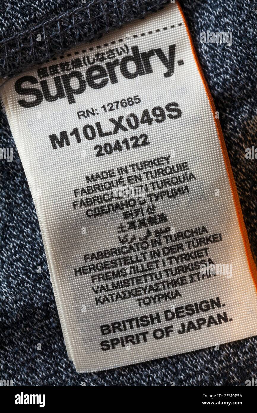 Superdry label in clothing made in Turkey - British design, spirit of Japan Stock Photo