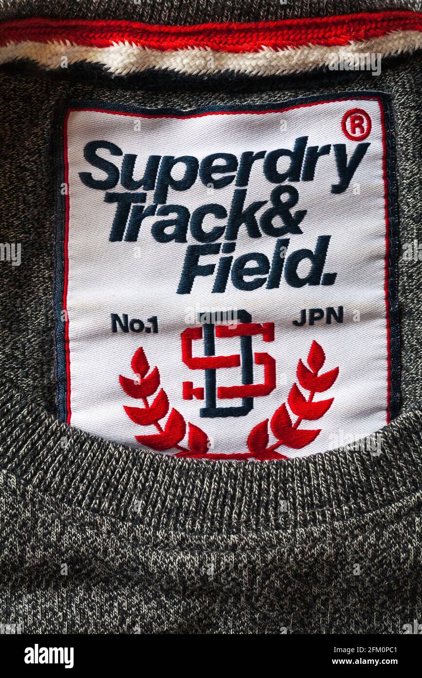 Superdry Track & Field label in clothing - Superdry clothes logo symbol  Stock Photo - Alamy