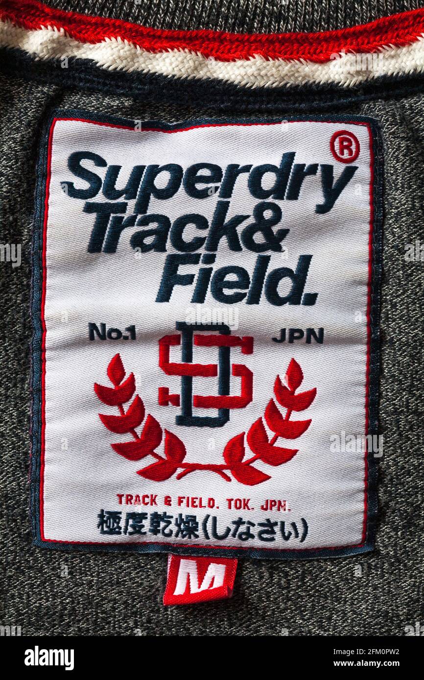 Superdry Track & Field label in clothing - Superdry clothes logo symbol  Stock Photo - Alamy