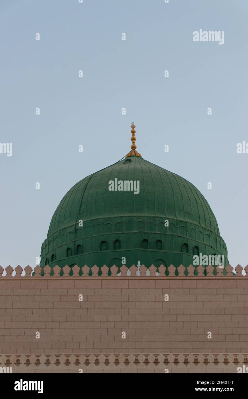 External image of the Prophet's Mosque in Medina in Saudi Arabia, The green dome of the mosque. Masjid Nabawi Stock Photo