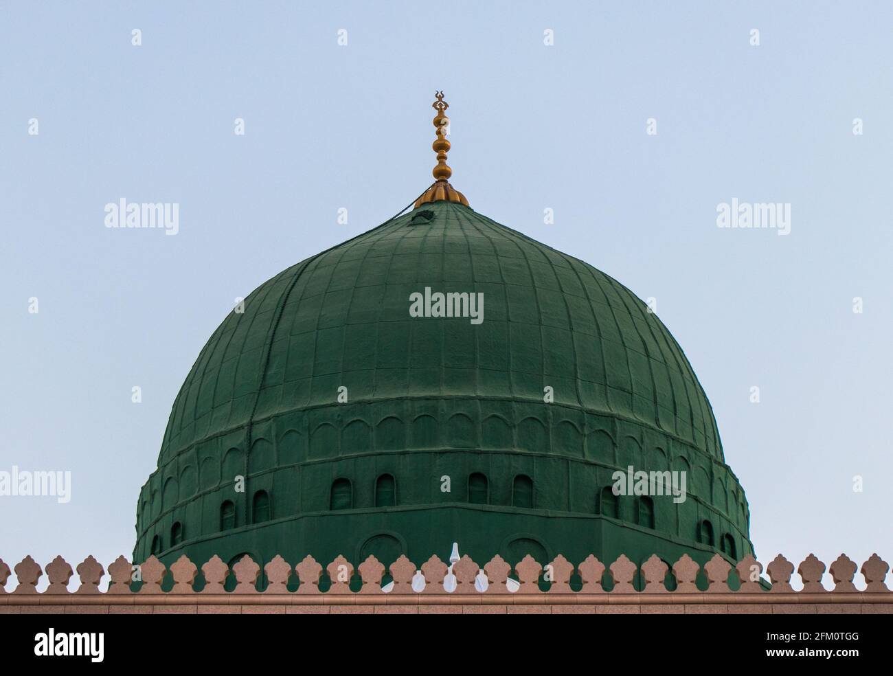 External image of the Prophet's Mosque in Medina in Saudi Arabia, The green dome of the mosque. Masjid Nabawi Stock Photo