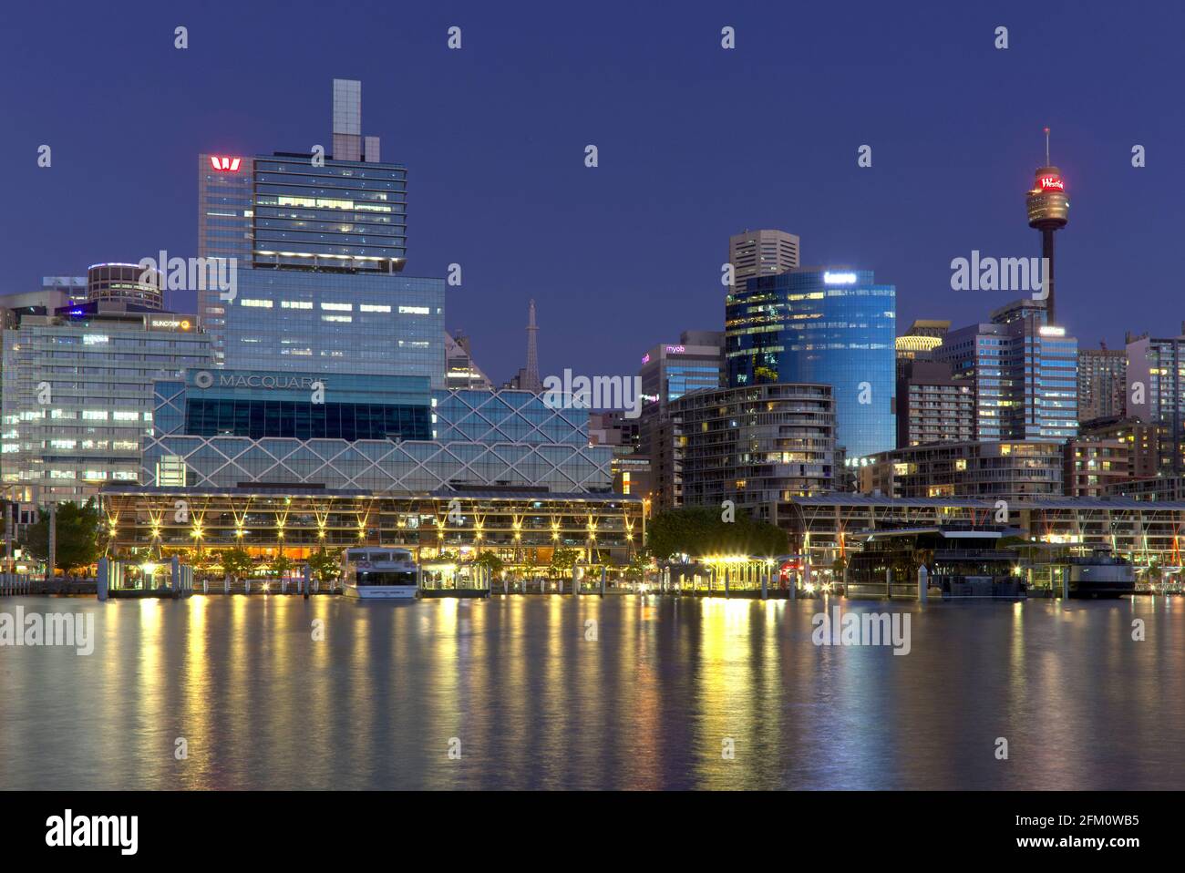 Sunset over One Shelly Street, the group headquarters for Macquarie Bank, Kings Wharf on Darling Harbour Sydney Australia. Stock Photo