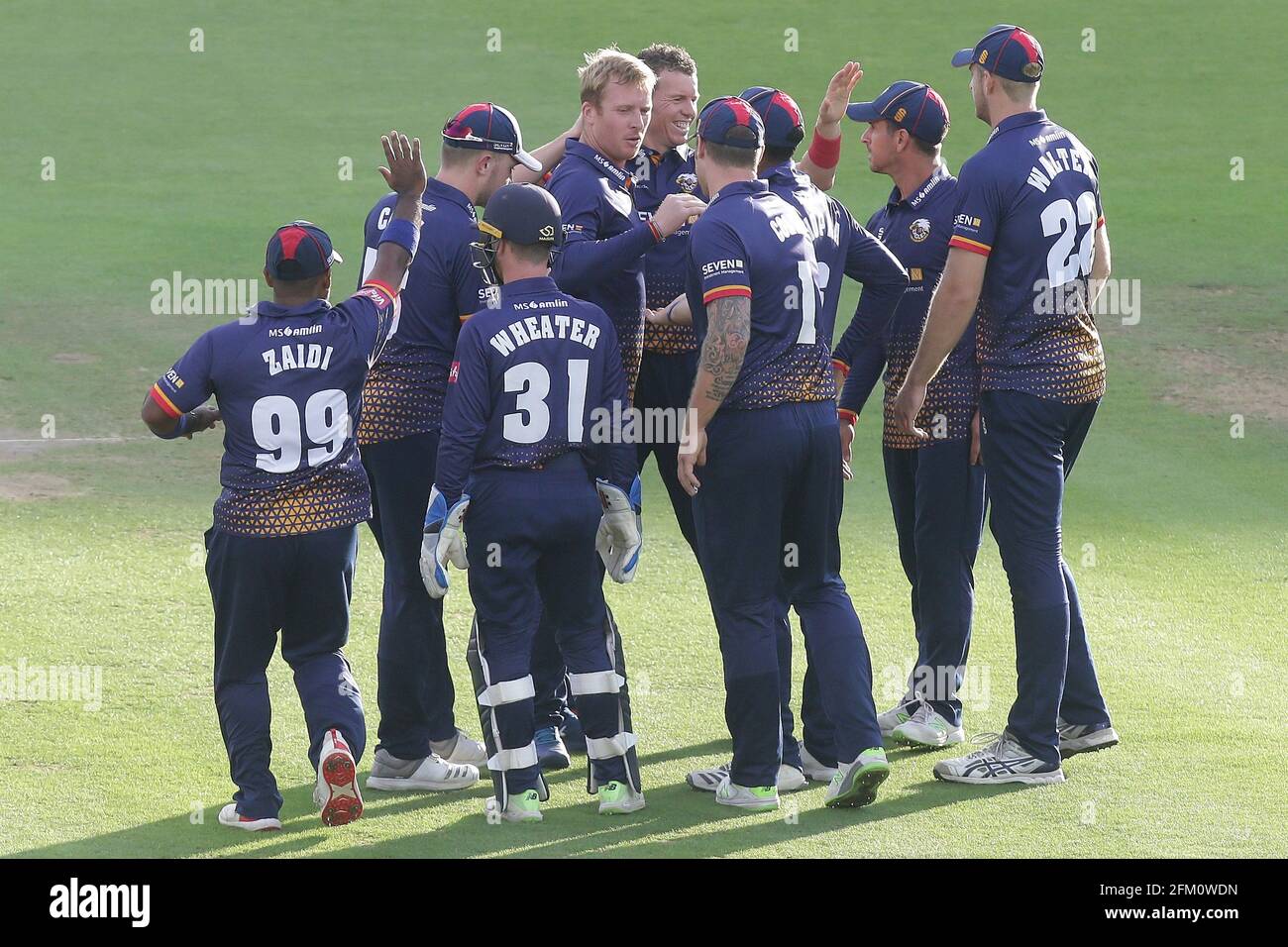 Simon Harmer of Essex celebrates with his team mates after taking the wicket of John Simpson during Middlesex vs Essex Eagles, Vitality Blast T20 Cric Stock Photo