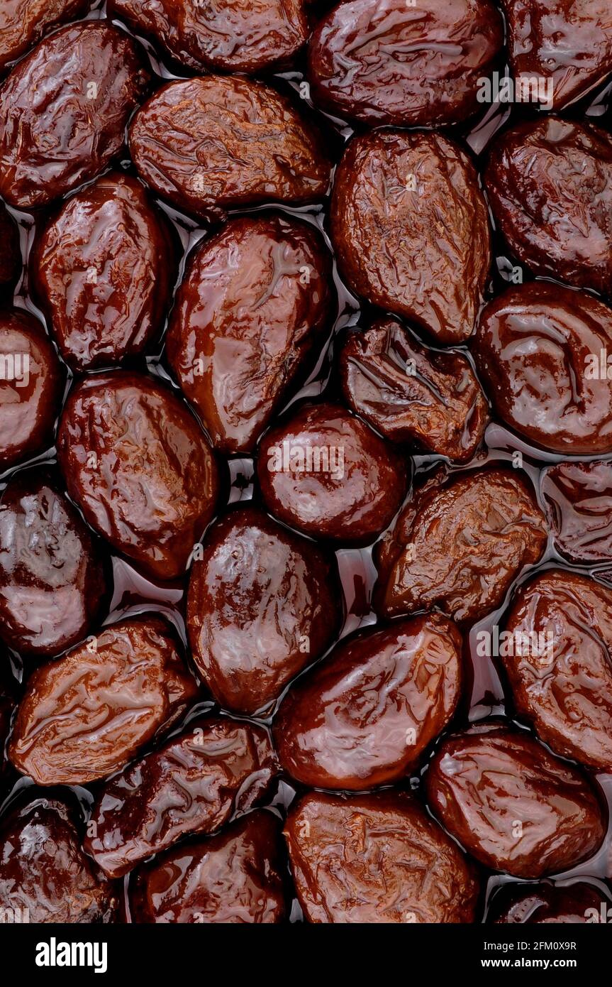 Prunes in juice made from dried plumb fruits high fibre healthy food