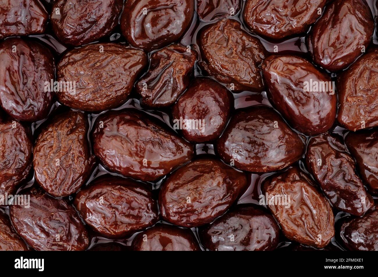 Prunes in juice made from dried plumb fruits high fibre healthy food