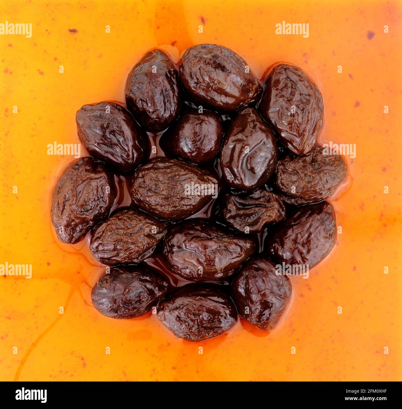 Prunes in juice made from dried plumb fruits high fibre healthy food