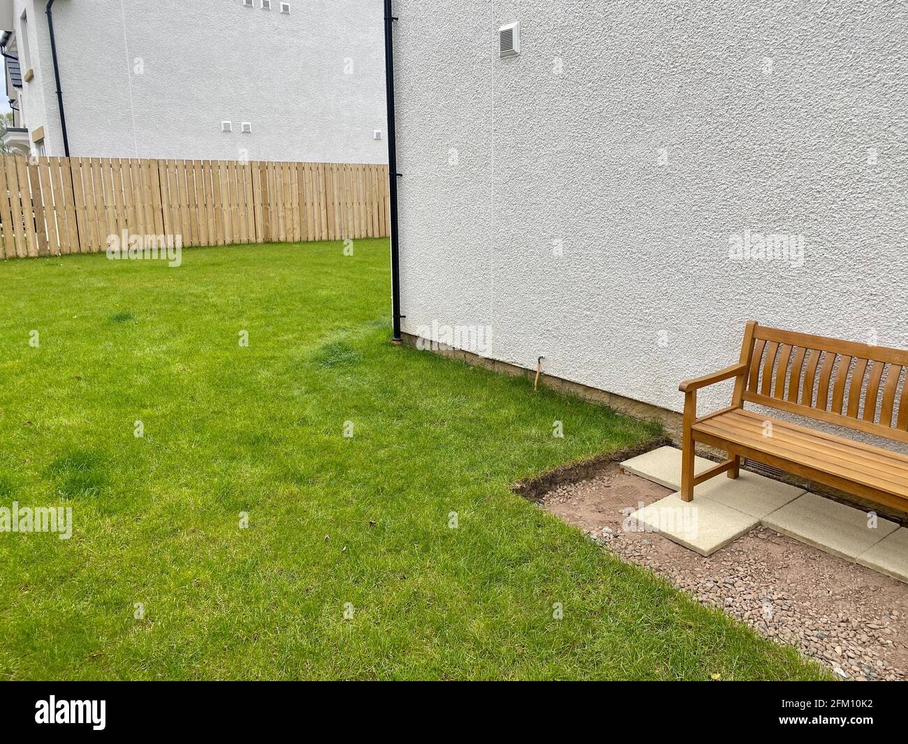 House garden grass turf cut for ground preparation to allow stone sub base to be laid Stock