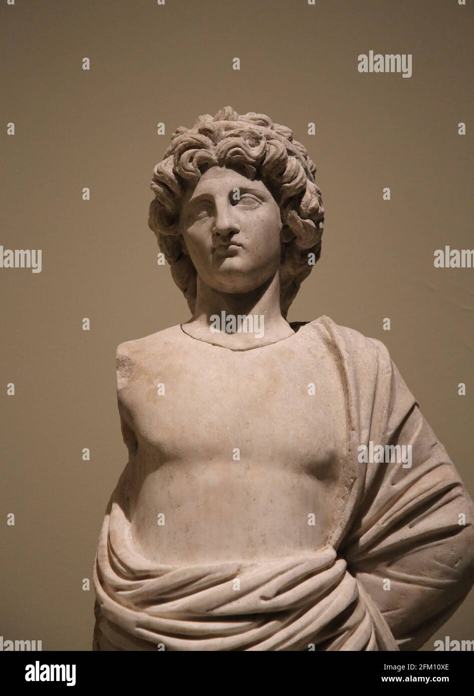 Marble statue of a man. Roman. 2nd BC. Temple of Apollo. Cyrene, Libya, Africa. Style portraits of Alexander the Great. Stock Photo