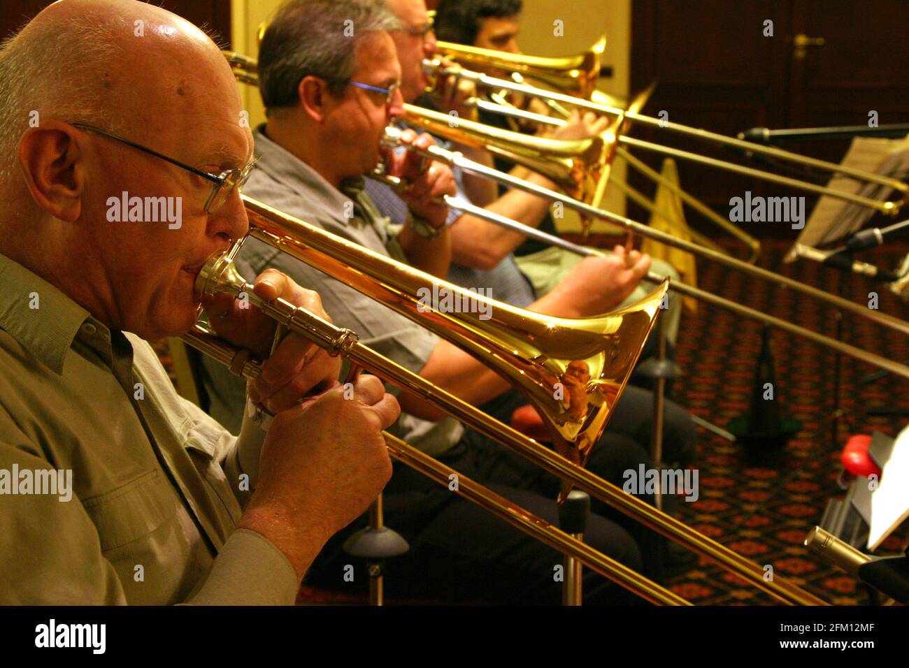 Trombone quartet rehearsing Stock Photo Alamy