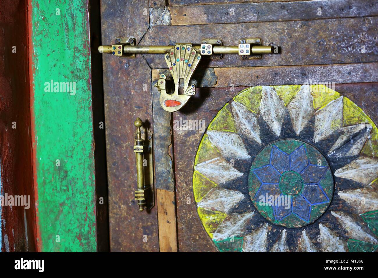 Colorful traditional aldrop of a entrance door of Kodhu tribal house at Korrakothavalasa village in Araku, Andhra Pradesh, India Stock Photo