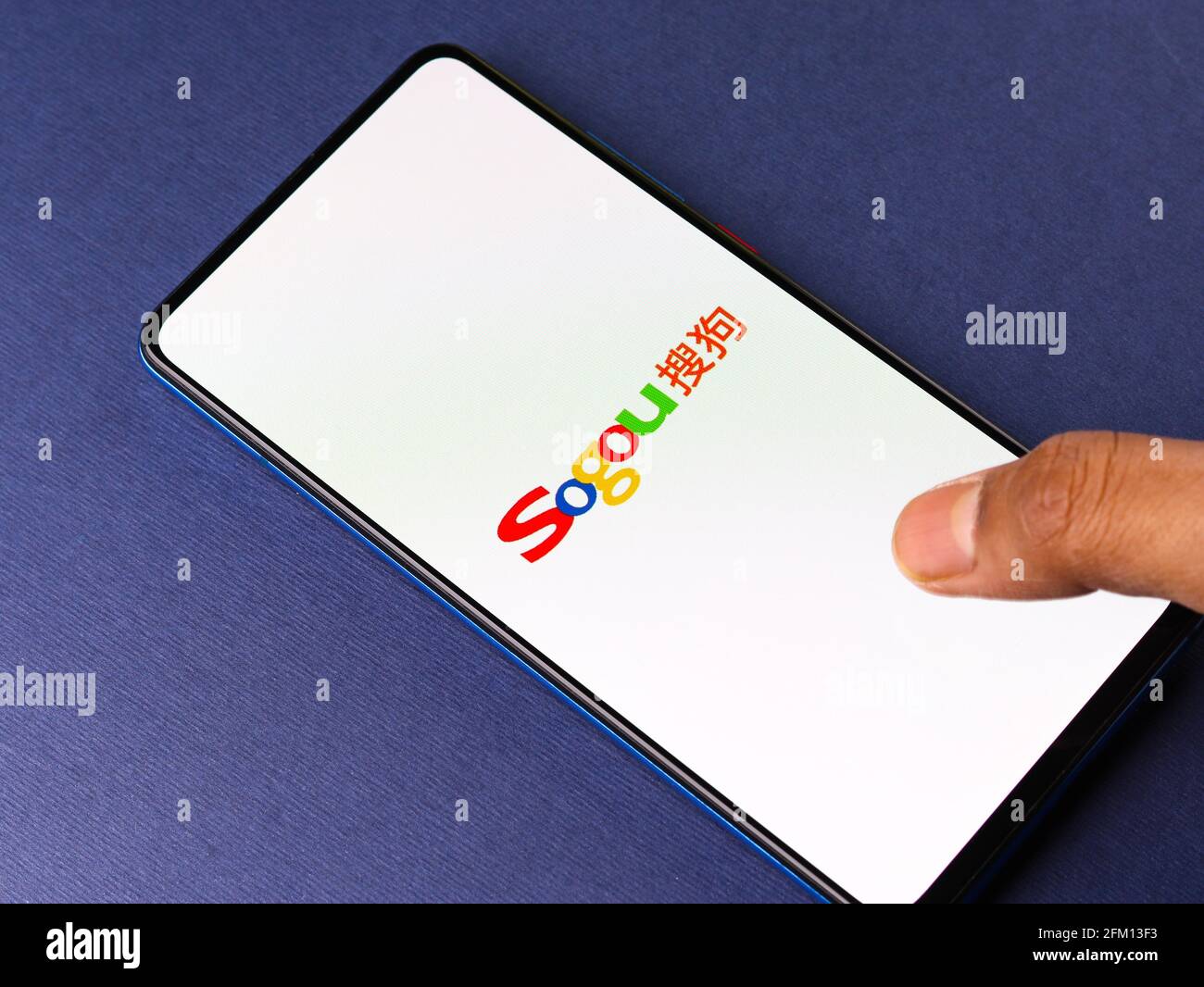 Assam, india - May 04, 2021 : Sogou logo on phone screen stock image. Stock Photo