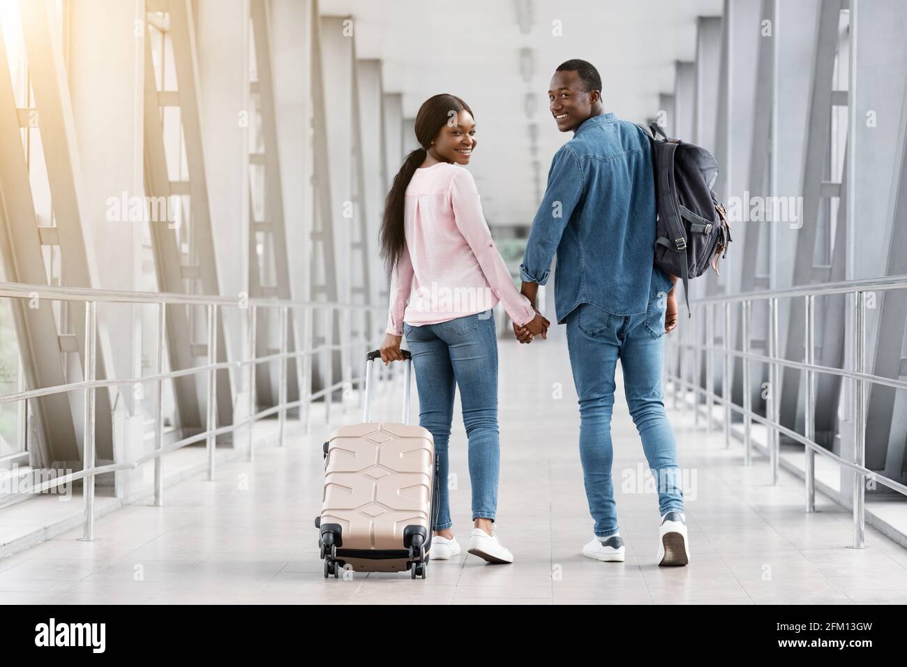Couple Travelling Concept. Romantic Black Spouses Walking With Luggage ...