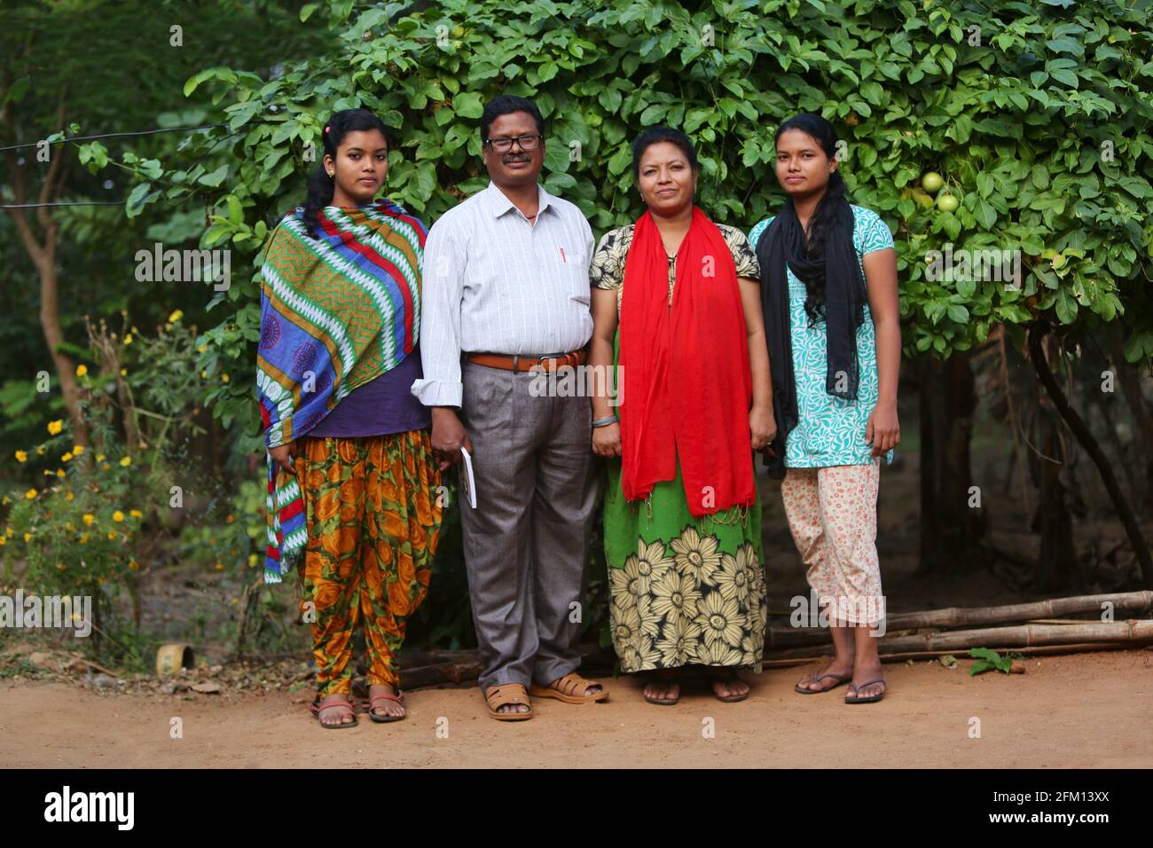 Tribal family at Nallaraiguda Village, Srikakulam District, Andhra Pradesh, India. SAVARA TRIBE Stock Photo